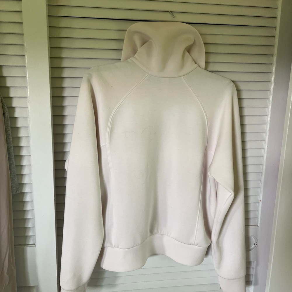 SPANX Cream Funnel Neck Zip Pullover Feels like air, on.